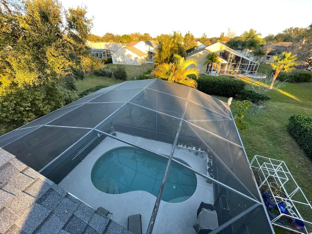 Aerial view of a completed pool enclosure rescreen in Orlando