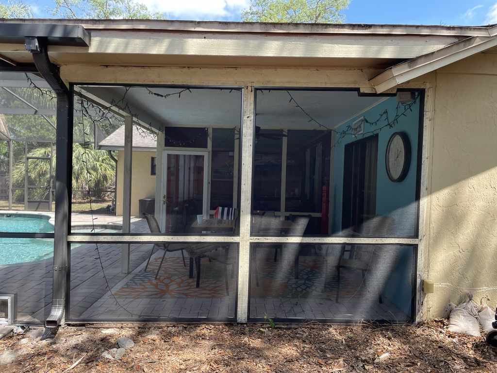 Interior of a screened lanai enclosure in Orlando